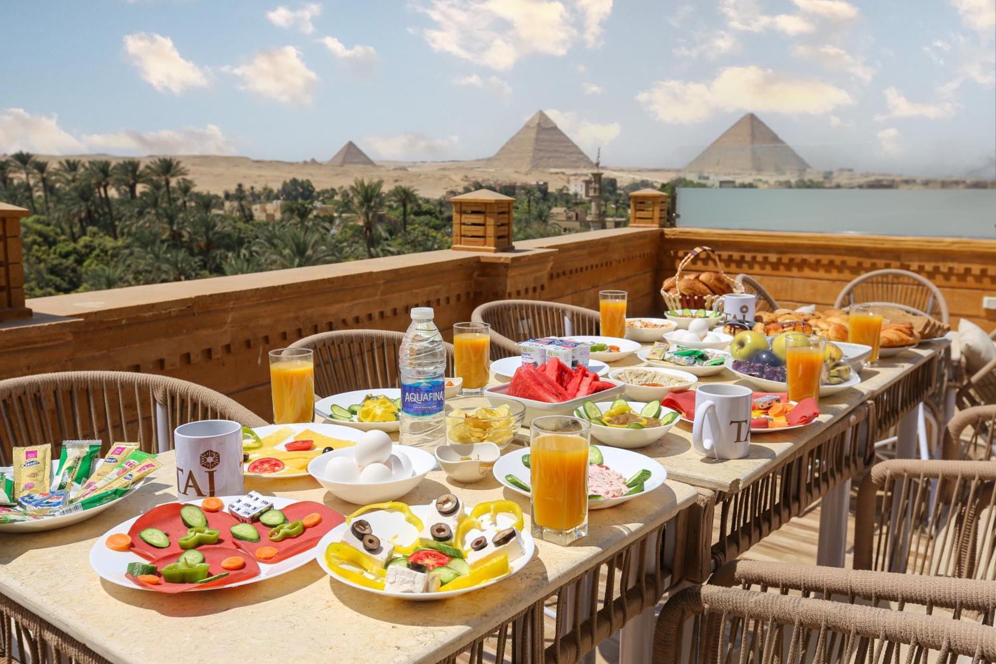 Kafret el-Gabal Taj Pyramids View Inn מראה חיצוני תמונה
