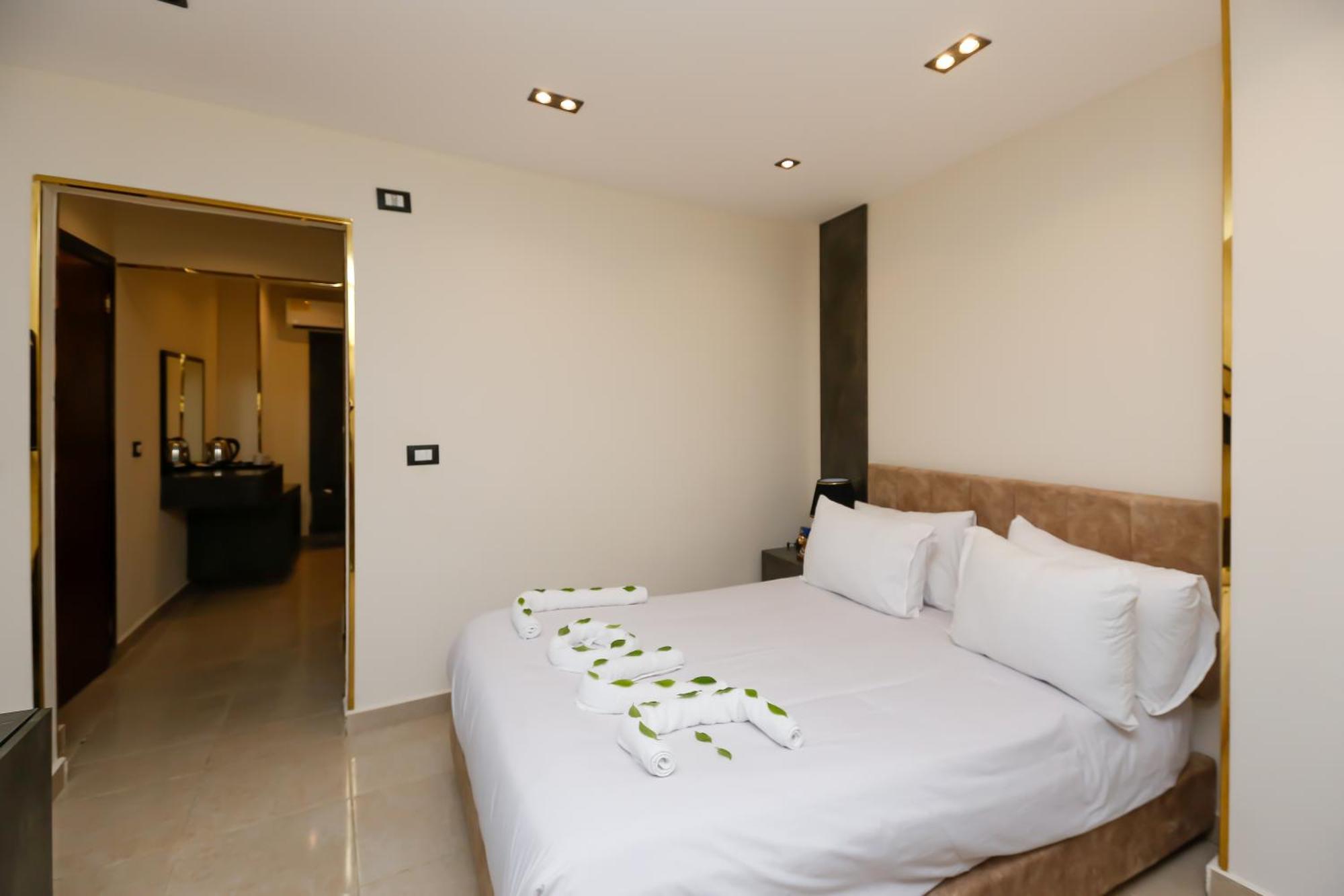 Kafret el-Gabal Taj Pyramids View Inn מראה חיצוני תמונה